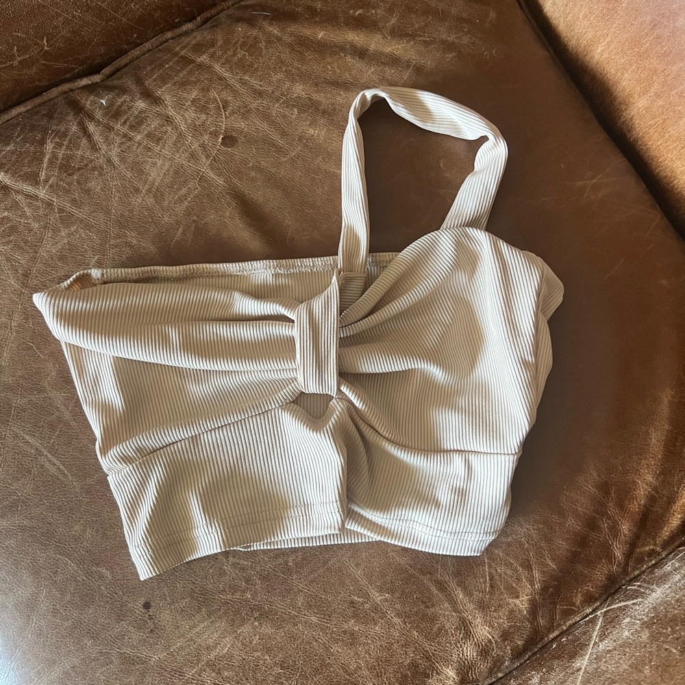 Cream colored one shoulder crop top